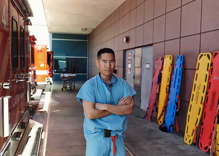 Dr. Kenji Inaba outside emergency entrace